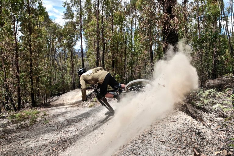 Shredly's Adventures | Lync railing a berm in St Helens on his mountain bike - MTB Tasmania